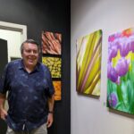 Gallery 2 - ADAS Gallery Director, Greg Starnes with his artwork at Blackhawk Gallery. Photo by ARTSCCC.