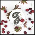 Gallery 1 - Handmade fabric earring jewelry in the shape of a paisley, surrounded by cherries.