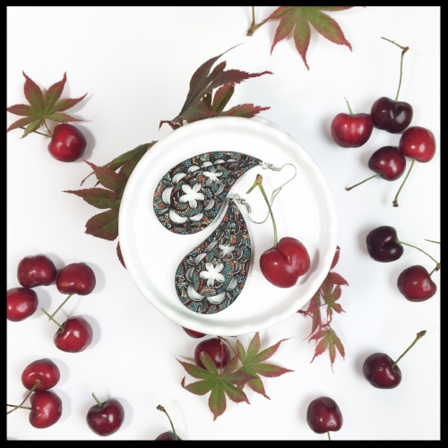 Gallery 1 - Handmade fabric earring jewelry in the shape of a paisley, surrounded by cherries.