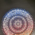 Gallery 1 - Round artwork with white curved lines. cool colors at the top and warm colors at the bottom.