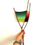 Gallery 1 - this is a tapestry weaving on a branch with ombre pattern.
