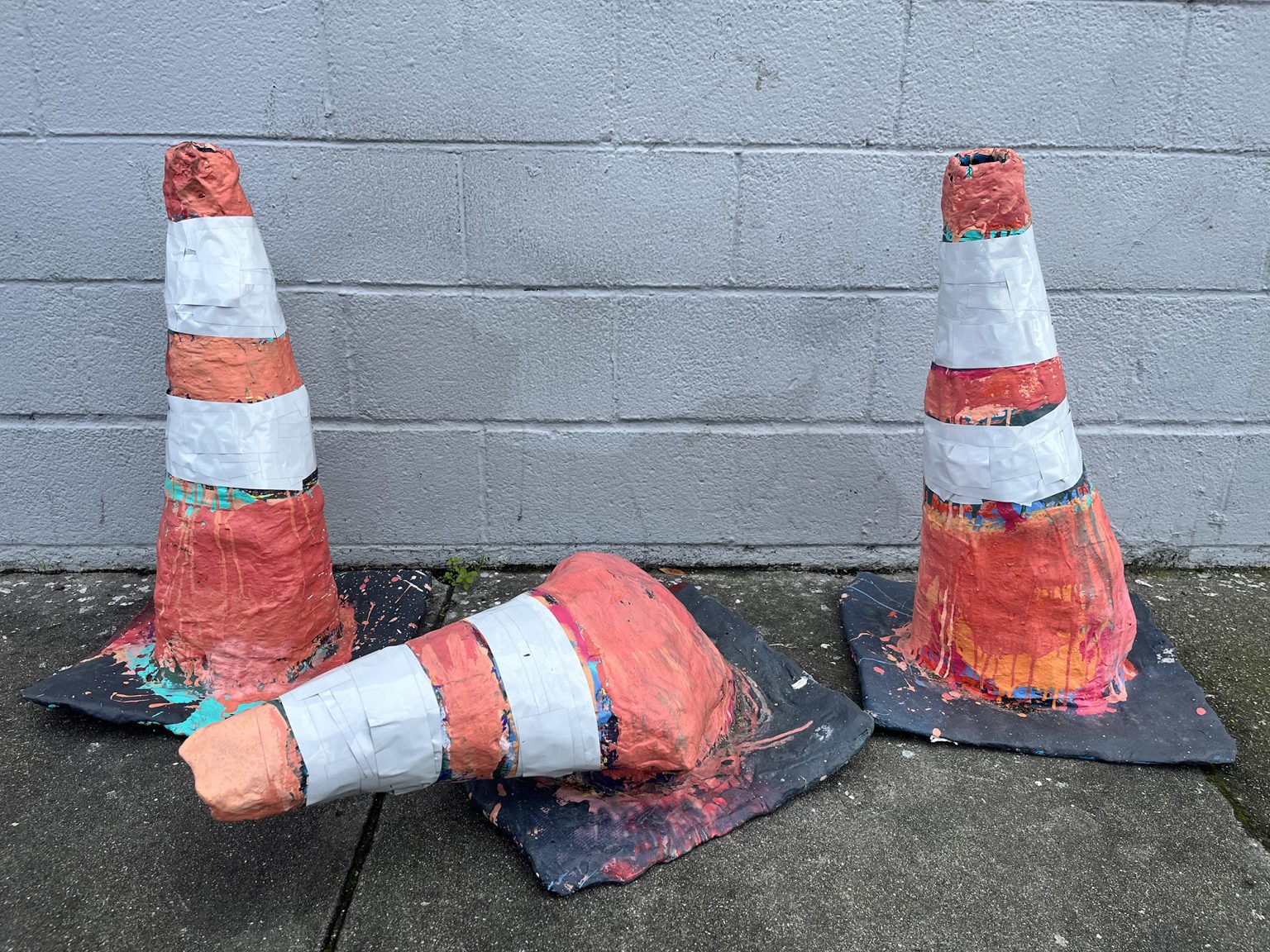 Gallery 2 - Photo of three traffic cones.