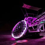 Gallery 2 - Large-scale mobile sculpture in the form of a dragonfly with large segmented eyes and wings.