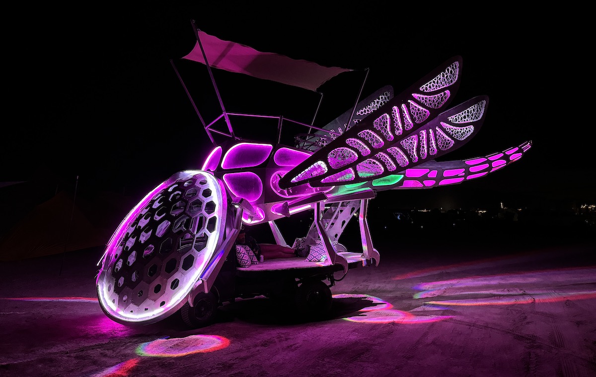 Gallery 2 - Large-scale mobile sculpture in the form of a dragonfly with large segmented eyes and wings.