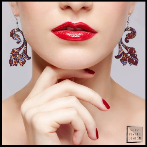 Gallery 4 - lower part of a woman's face with bright screen wearing handmade fabric jewelry.