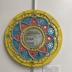 Gallery 4 - circular artwork with yellow edge and green and red center