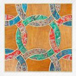 Gallery 7 - Handmade fabric wall-art consists of multiple colorful circles intertwined with one another.
