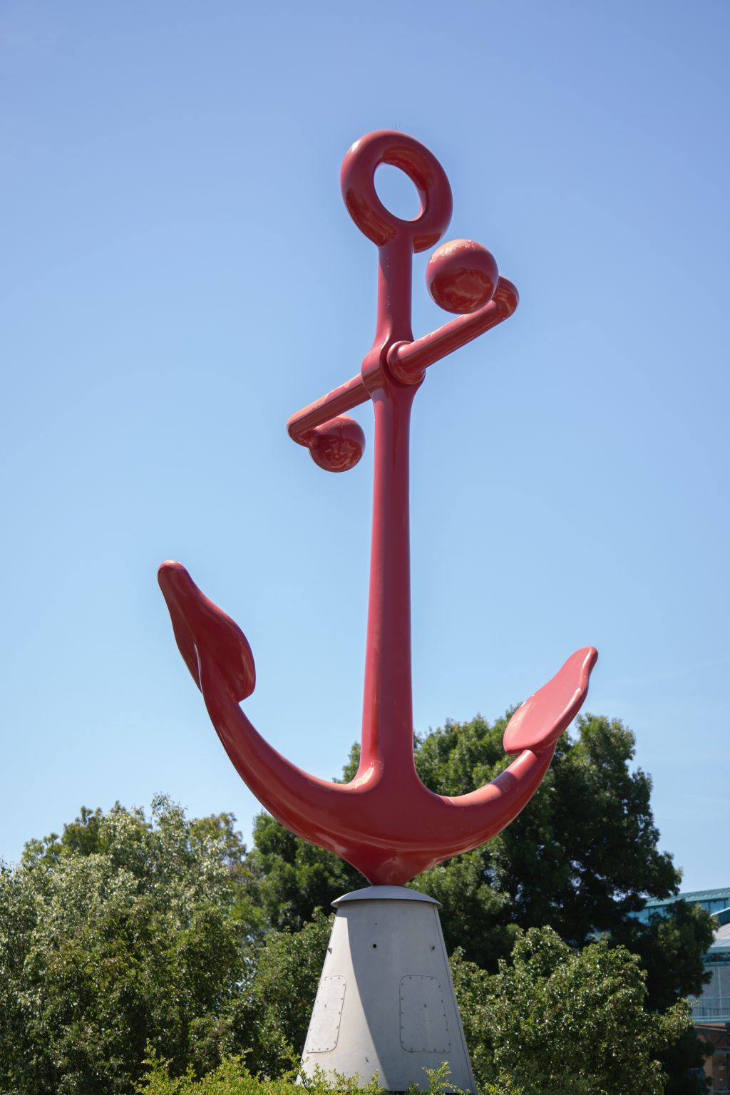 Gallery 1 - Low angle photo of a large red Anchor sculpture