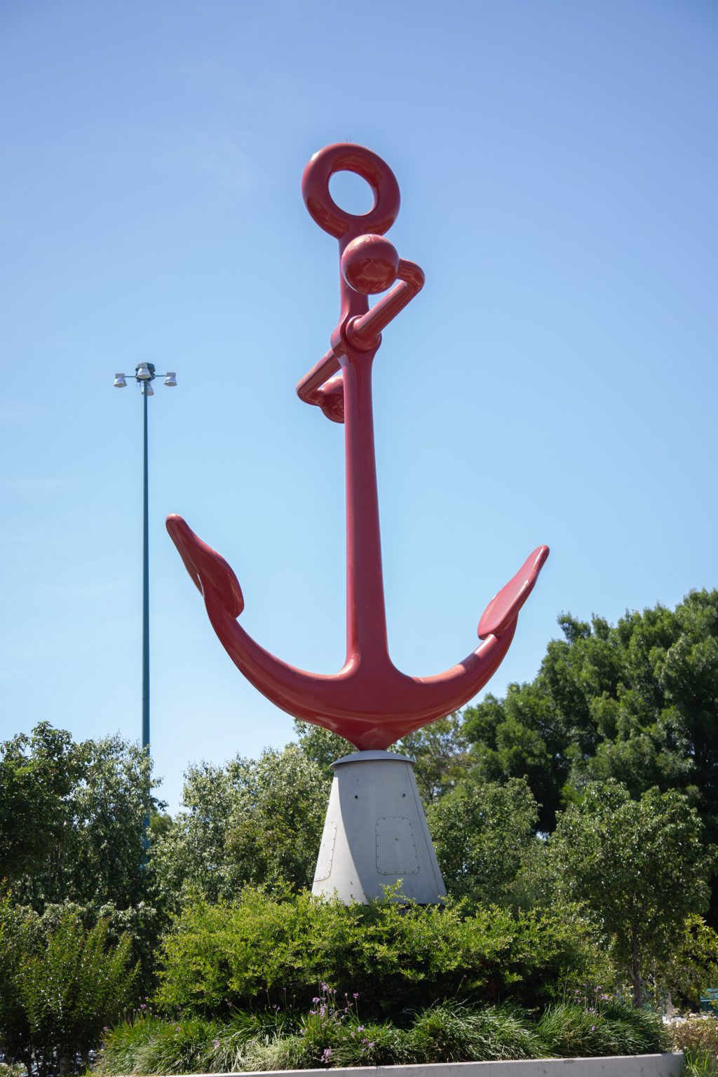 Gallery 2 - Low angle photo of a large red Anchor sculpture