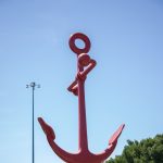 Gallery 2 - Low angle photo of a large red Anchor sculpture