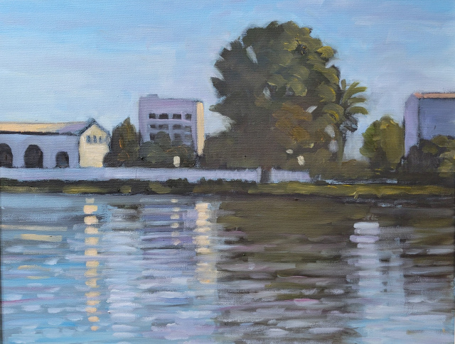 Gallery 9 - Buildings and trees reflecting in a lake in Oakland