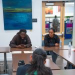Gallery 1 - Donté Clark & Monique McCoy sitting at a table during a Youth Arts Connection workshop at the Brentwood Library.