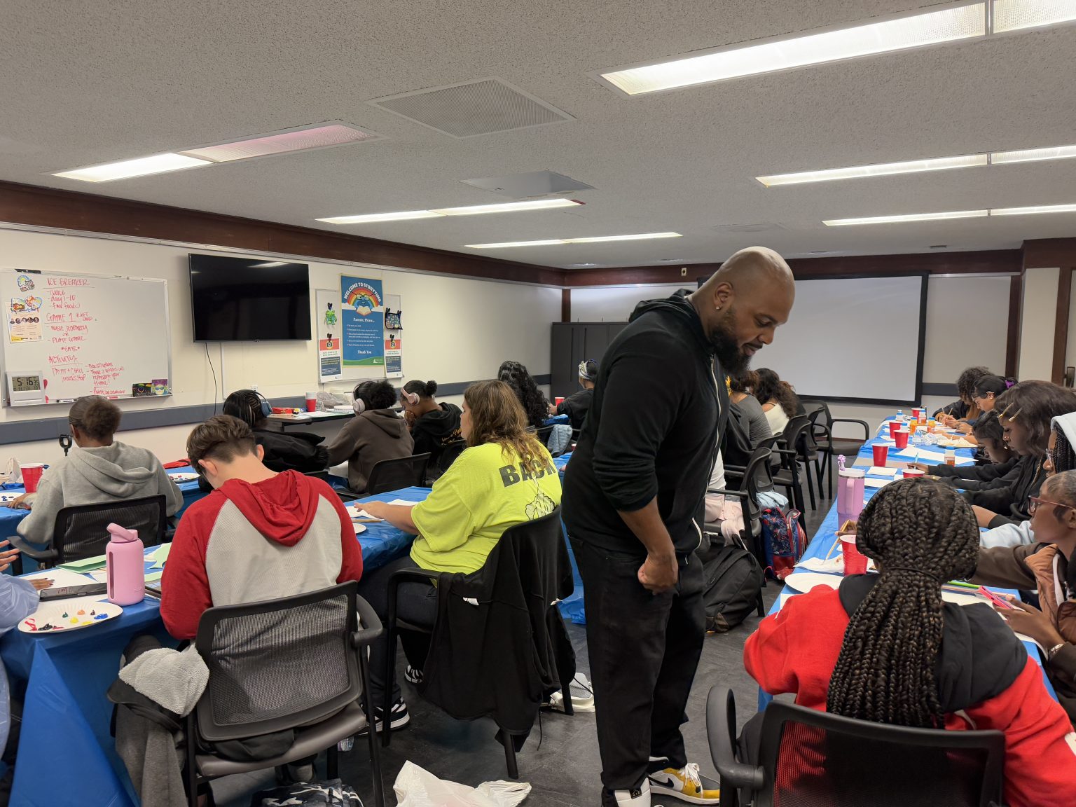 Gallery 2 - Jeremy Phillips leading an activity at a “Youth Arts Connection” workshop at the Antioch Library, 20