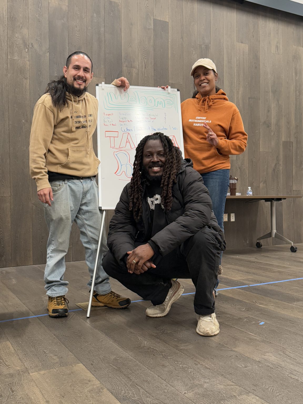 Gallery 3 - José Cordón, Donté Clark & Monique McCoy posing around a whiteboard at a Youth Arts Connection workshop at the Brentwood Library.