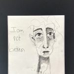 Gallery 3 - A graphite sketch on textured paper features a stylized, expressive face with large eyes and an elongated neck, with the handwritten text 