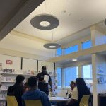 Gallery 4 - Jeremy Phillips leading a “Youth Arts Connection” workshop in front of sitting students at the Pittsburg Library.