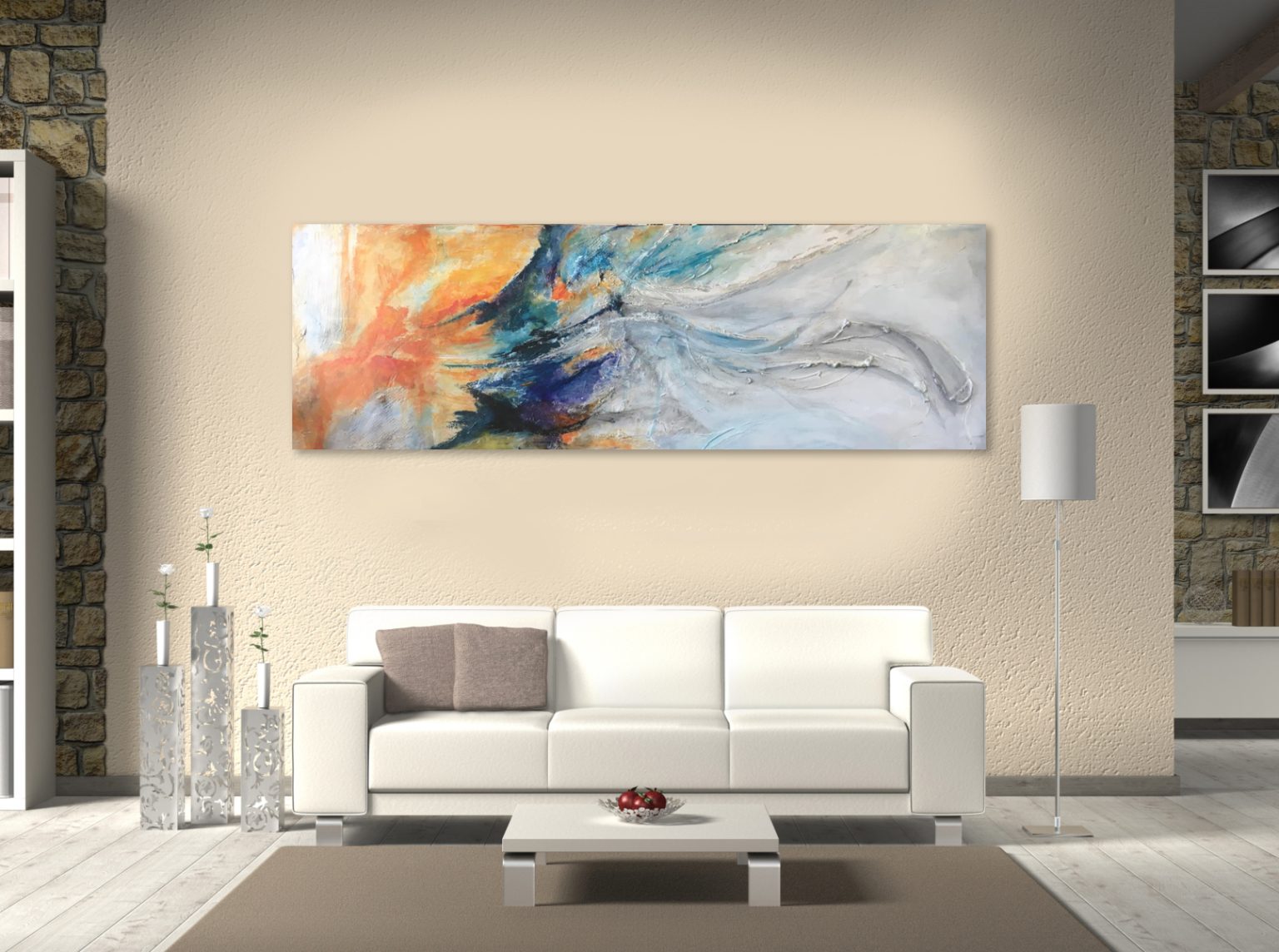 Gallery 7 - Long, horizontal abstract painting with orange, blue, and white colors above a white sofa.