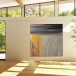 Gallery 9 - Abstract yellow, gray, and brown painting centered on a light-filled wall with floor-to-ceiling windows.