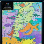 Gallery 1 - A brightly colored, cartoon-style mural on a rectangular Bigbelly trash bin showing a human figure swimming among numerous smiling and whimsical sea creatures, including a large orange fish and an octopus playing a golden harp.