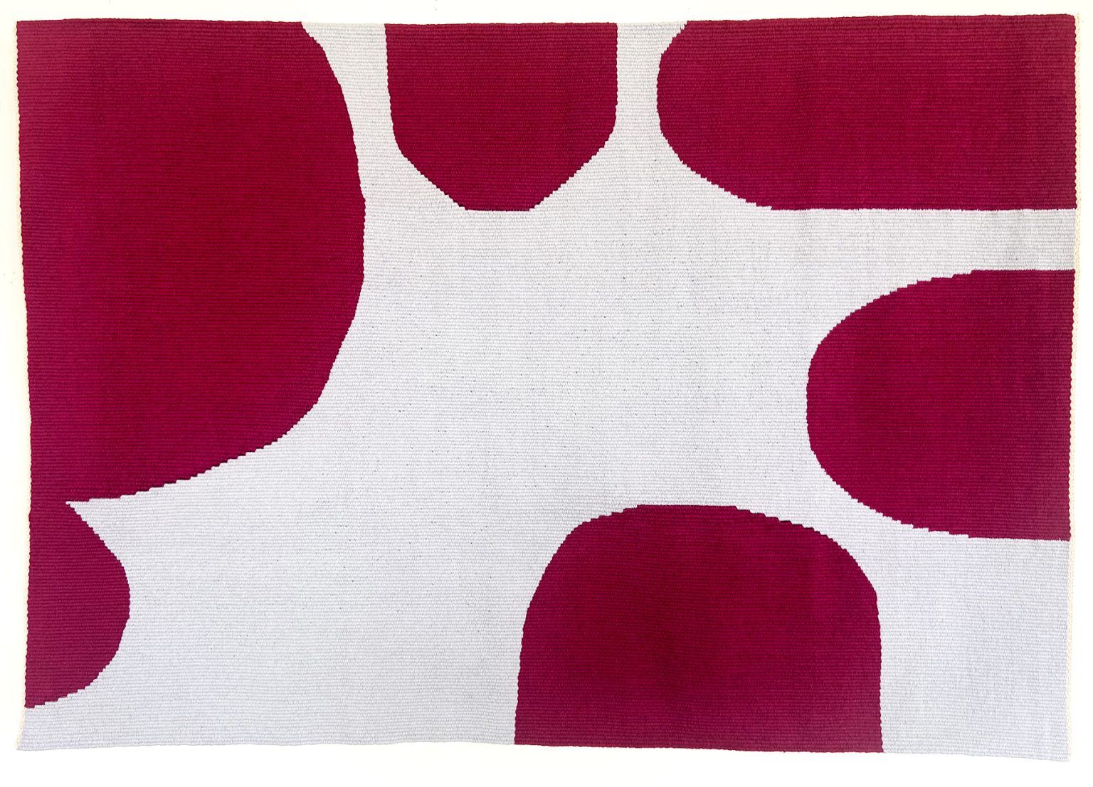 Gallery 1 - A gray and burgundy tapestry of misc size round shapes in the form of a huddle.