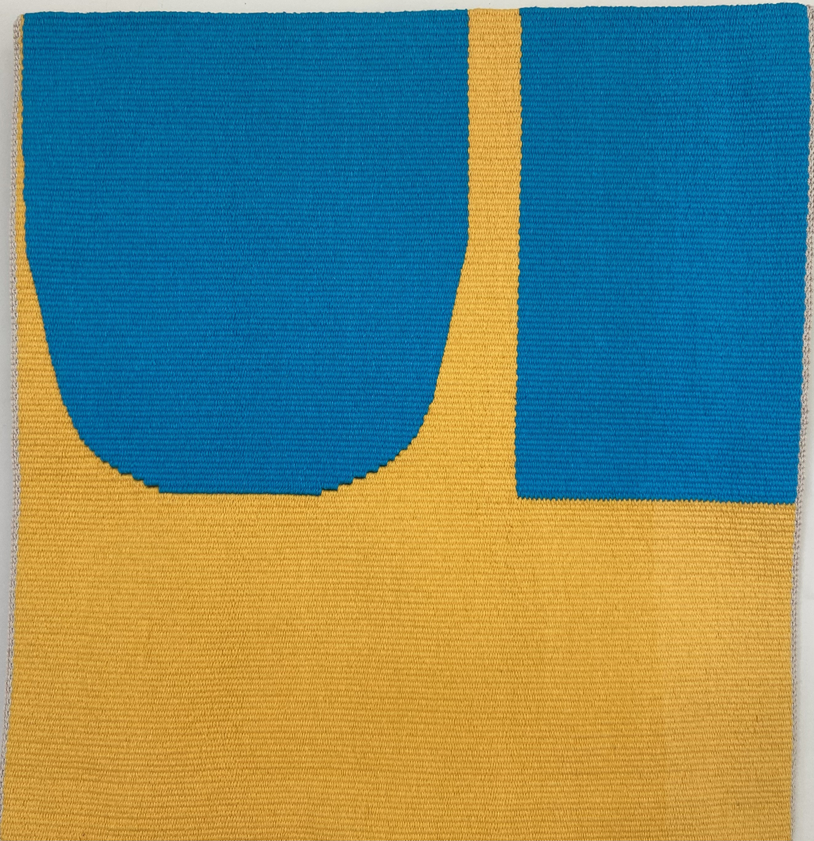 Gallery 8 - An abstract blue and yellow tapestry.
