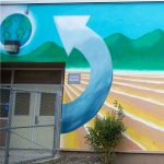 Gallery 1 - Mural painting of a farmer planting seeds.