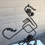 Gallery 5 - Forged and bent steel; rebar, threaded pipe, steel plate, angles, cubes, screw tip, steel discs, oil