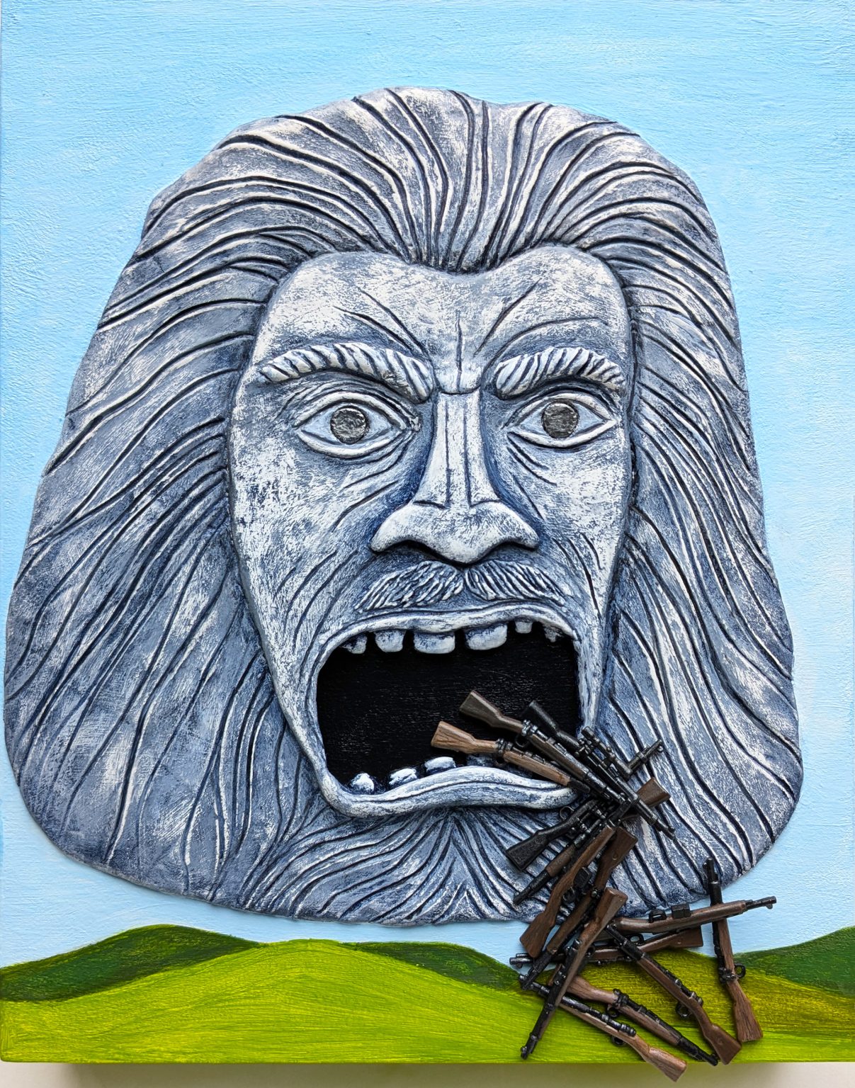 Gallery 4 - A stone head hovers above a simple hillside landscape, toy guns pouring from its large mouth