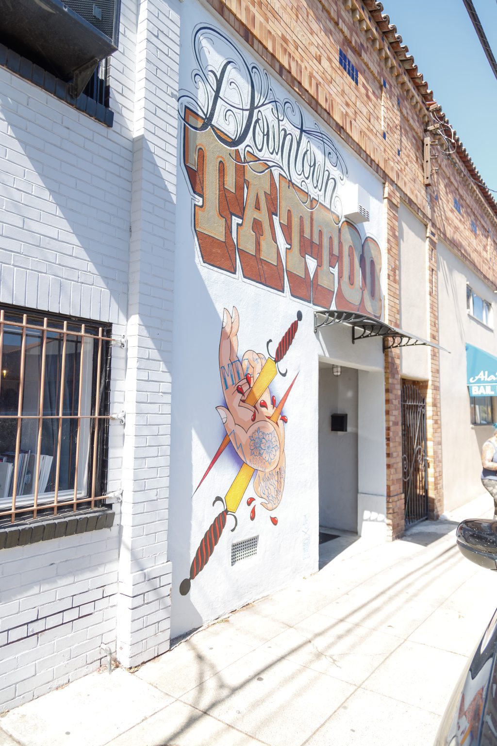 Gallery 3 - A photograph of the building facade at 710 Las Juntas Street in Martinez, California, showing a painted 